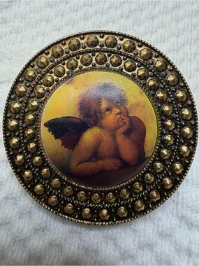 Vintage Gold-Tone Cherub Brooch with Yellow and Brown Accents